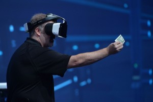 Intel?s Craig Raymond displays the Project Alloy virtual reality headset during the Day 1 keynote at the 2016 Intel Developer Forum in San Francisco on Tuesday, Aug. 16, 2016. Intel CEO Brian Krzanich?s keynote presentation offered perspective on the unique role Intel will play as the boundaries of computing continue to expand. (Credit: Intel Corporation)